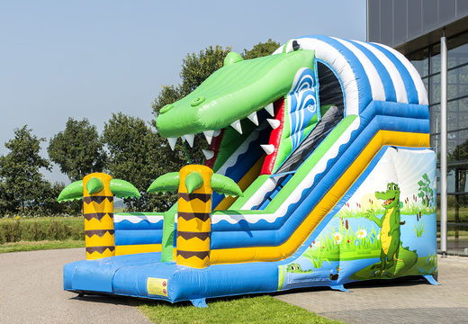 Espectacular escorrega inflável com tema crocodilo e cores alegres para as crianças. Compre escorregadores infláveis ​​agora online na JB Insuflaveis Portugal