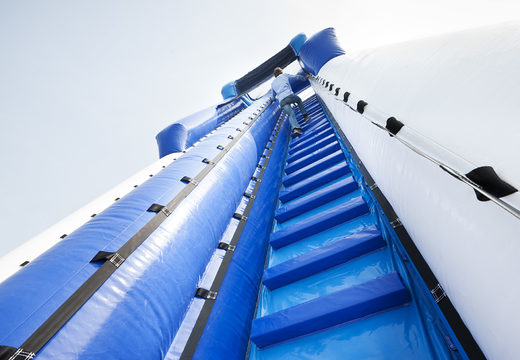 Obtenha seu escorregador inflável monstro inflável de 11 metros de altura e 53 metros de comprimento com uma escada dupla para crianças. Encomende escorregas insufláveis ​​online na JB Insuflaveis Portugal