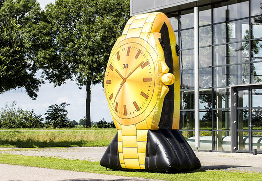 Compre um relógio inflável de ouro de 4 metros de altura. Encomende castelos insufláveis ​​agora online na JB Insuflaveis Portugal