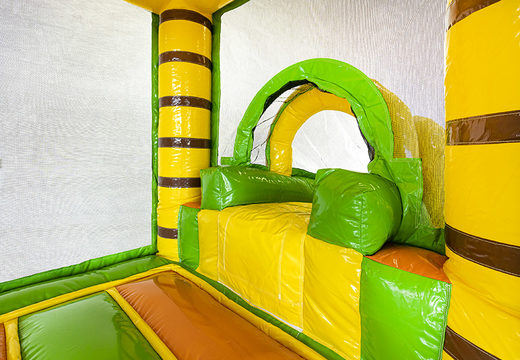 Compre um pequeno castelo insuflável com tema de selva e escorregador para crianças. Encomende castelos insufláveis ​​online na JB Insufláveis ​​Portugal