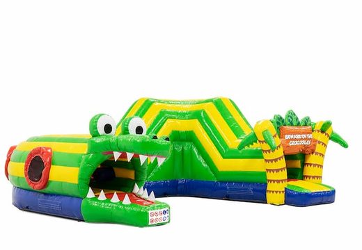 Encomende um castelo insuflável em túnel de crocodilo com obstáculos, uma rampa de escalada e escorrega para as crianças. Compre castelos insufláveis ​​online na JB Insufláveis Portugal