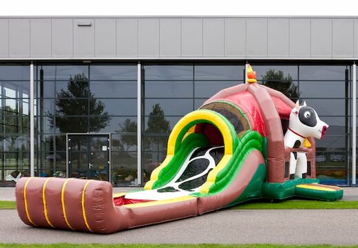Groot opblaasbaar overdekt multiplay super springkasteel met glijbaan kopen in thema boerderij farm voor kinderen