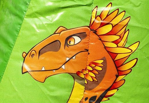 Compre um pequeno castelo insuflável nas cores verde e laranja com tema de telhado com dinossauro, para crianças. Castelos insufláveis ​​disponíveis na JB Insufláveis ​​Portugal online