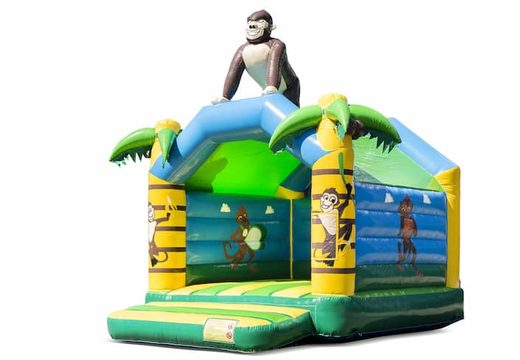 Compre um castelo insuflável da selva padrão em cores marcantes com um grande objeto 3D gorila no topo para as crianças. Compre castelos insufláveis ​​​​online na JB Insufláveis ​​Portugal