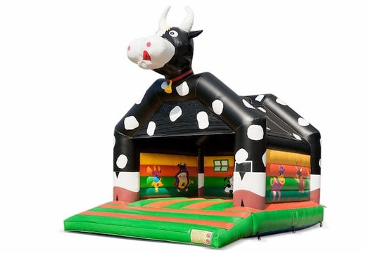 Grande castelo insuflável no tema vaca, com um telhado à venda para crianças. Disponível em JB Insufláveis ​​Portugal online