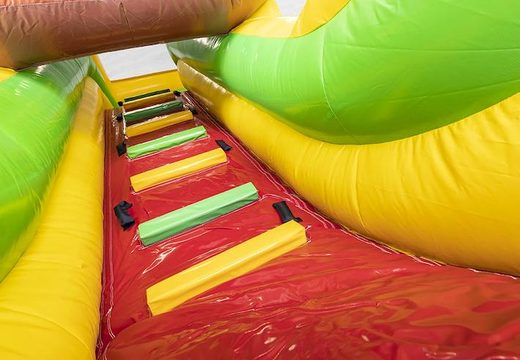 Escorrega almofada de ar inflável tema selva para crianças à venda