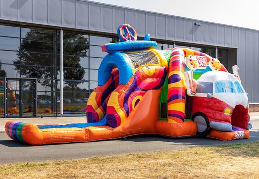 Castelo inflável mutliplay super inflável coberto com slide no tema hippie para venda