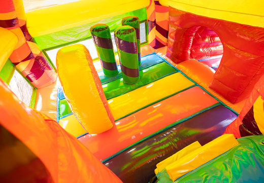 Encomende castelo inflável inflável coberto com slide no tema hippie com muitas cores
